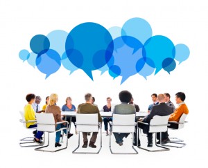 Diverse People in Meeting With Speech Bubbles
